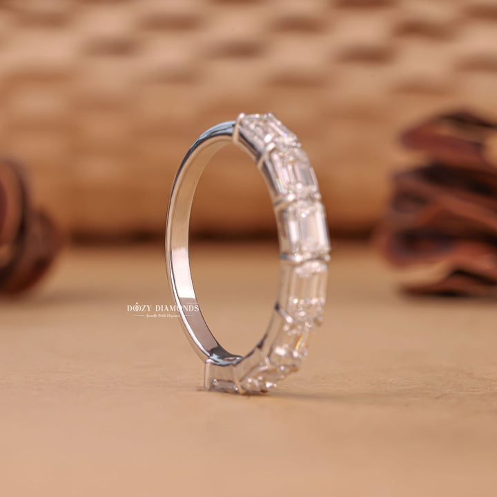 Eternity diamond band stacked with engagement ring