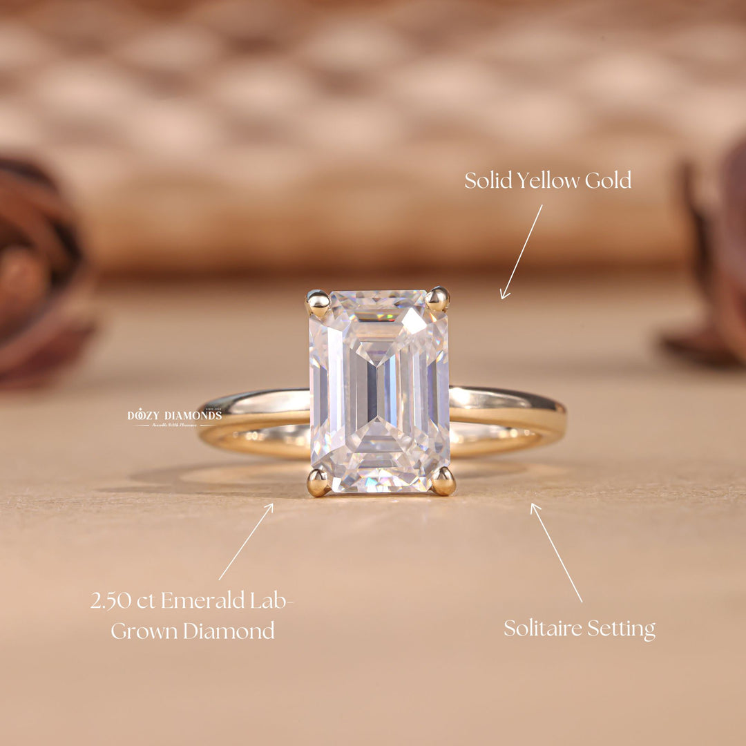 Side angle of emerald solitaire diamond engagement ring