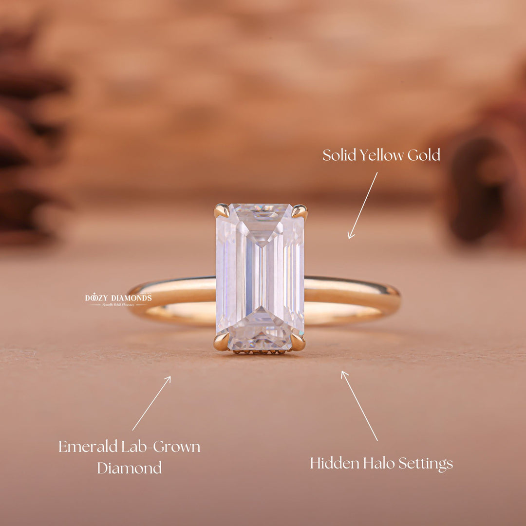 Emerald cut diamond ring worn on hand