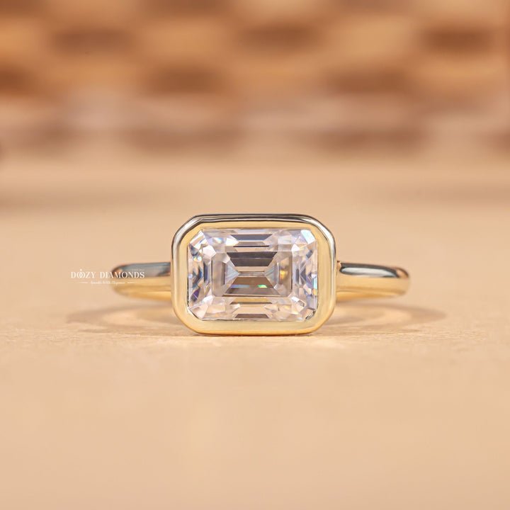 2.0CT emerald cut bezel engagement ring available to buy now