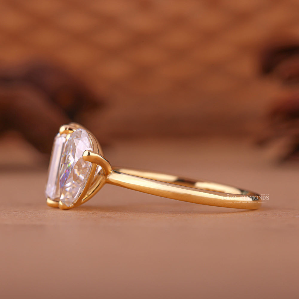 Pear solitaire engagement ring photographed in natural light