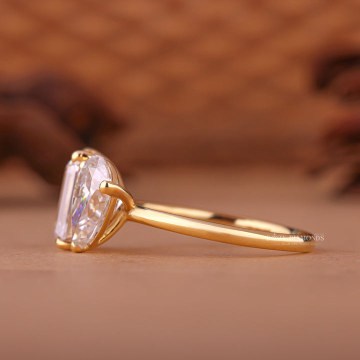 Pear solitaire engagement ring photographed in natural light