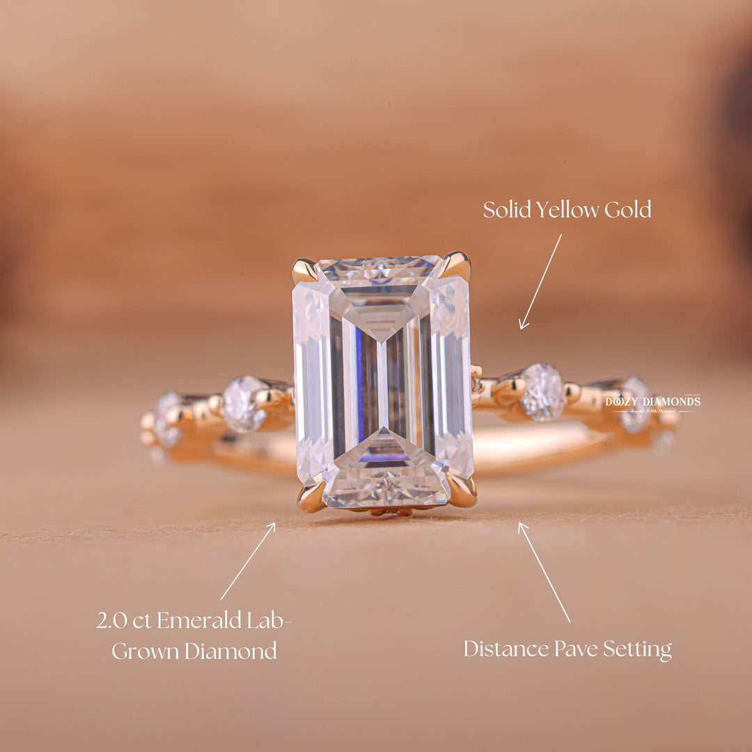 Emerald cut engagement ring shown with authenticity certificate