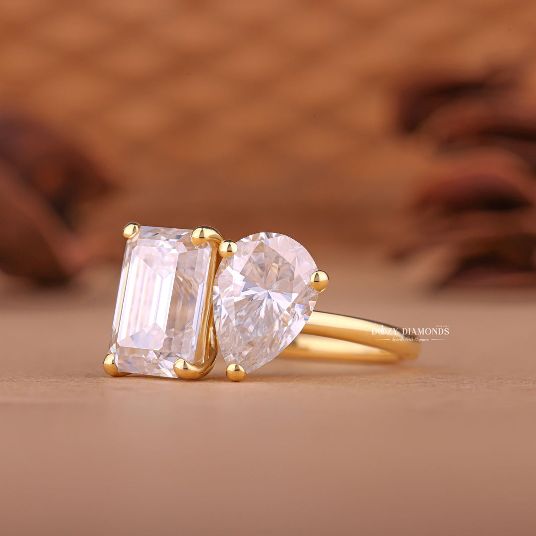 Pear solitaire diamond ring displayed on jewelry stand