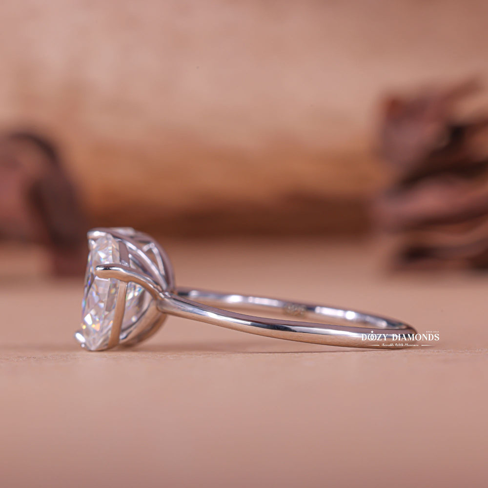 Premium pear cut solitaire engagement ring crafted in solid gold