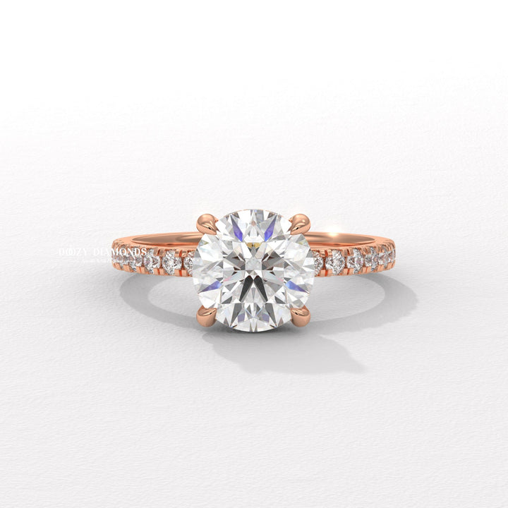 Angled view of round cut diamond in hidden halo setting