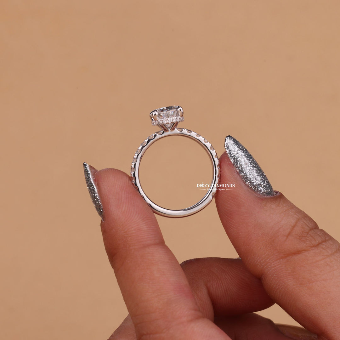 Oval hidden halo engagement ring with brilliant diamond sparkle
