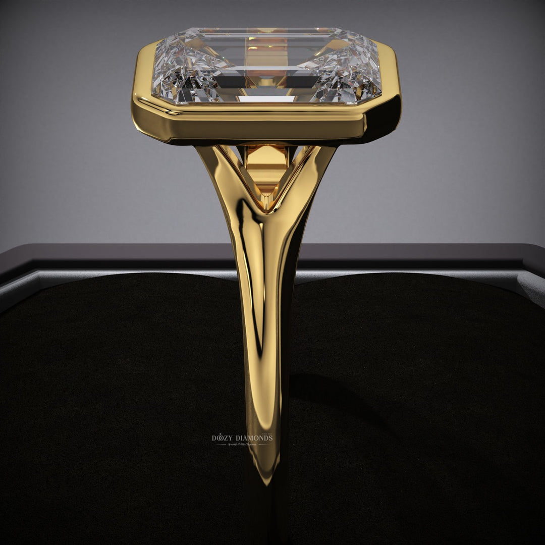 Emerald cut bezel engagement ring with IGI certified center diamond