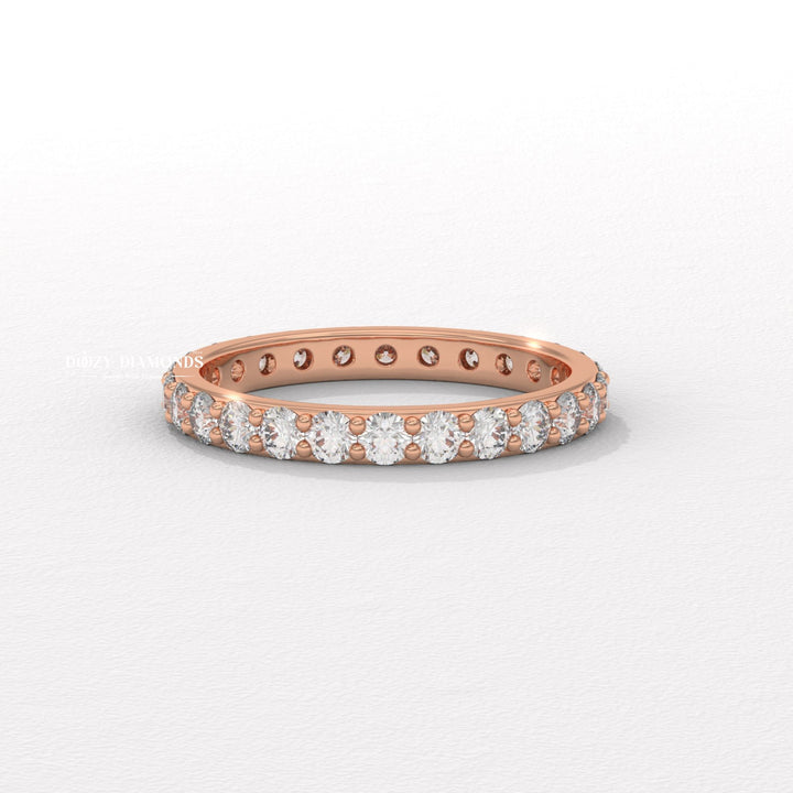 Shared Prong lab grown diamond band worn on hand