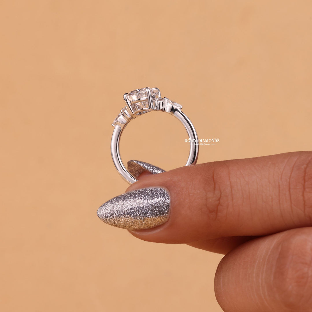 Oval cut cluster engagement ring with IGI certified center diamond