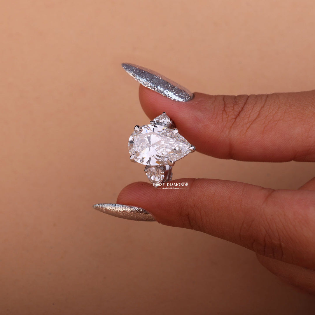 Pear three stone lab grown diamond ring in jewelry gift box