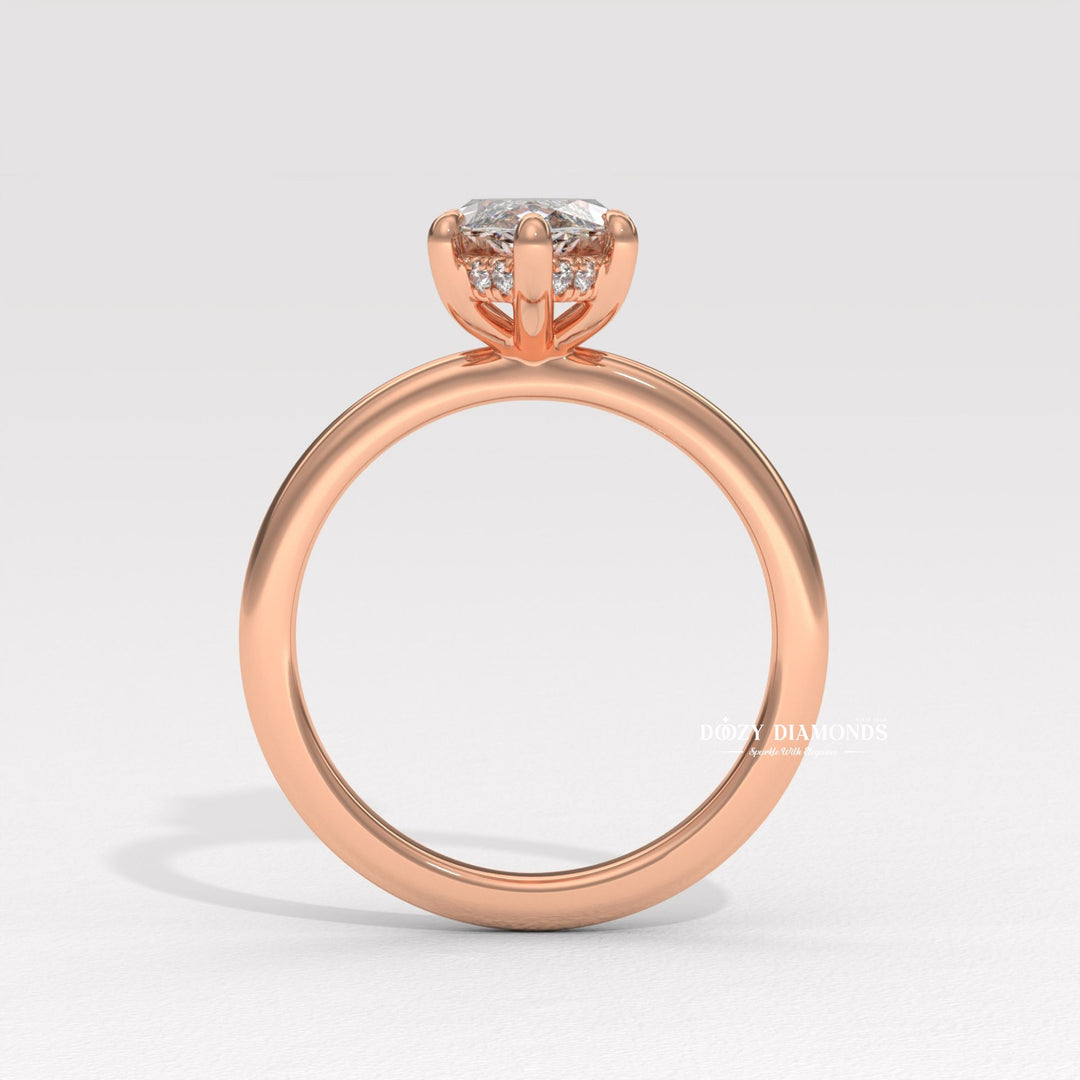 IGI certified marquise cut diamond in hidden halo engagement ring setting