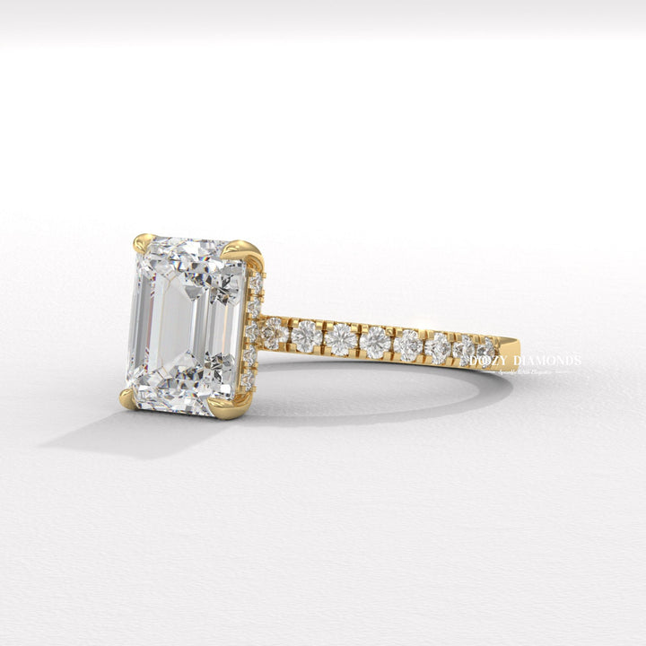 Emerald cut pave engagement ring shown in real-life wear