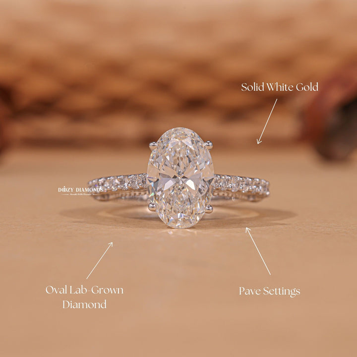Oval hidden halo engagement ring with IGI certificate and packaging
