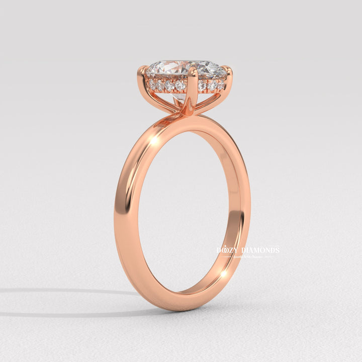 Oval cut engagement ring side view showing band detail