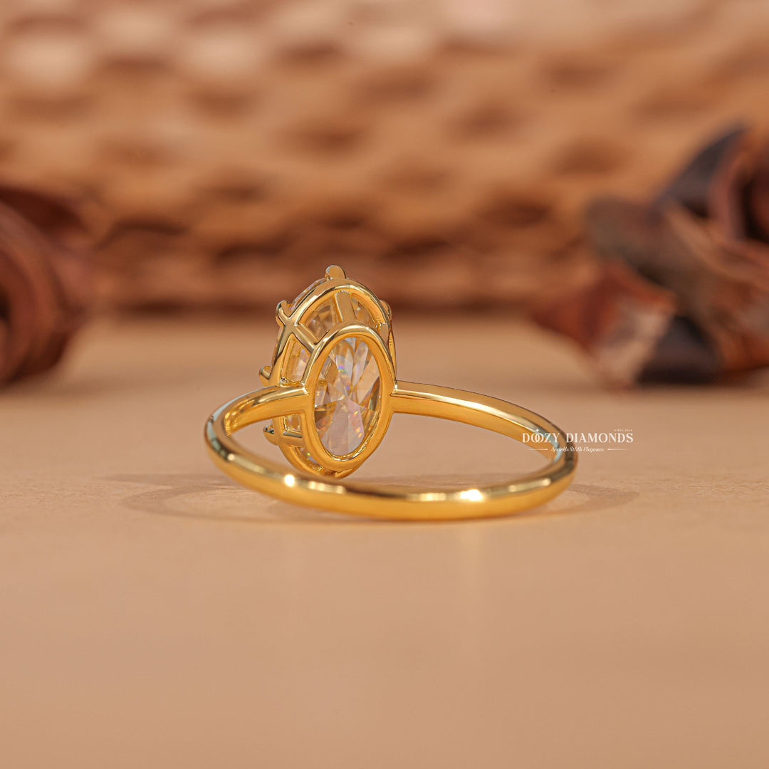 Oval cut solitaire engagement ring shown in real-life wear