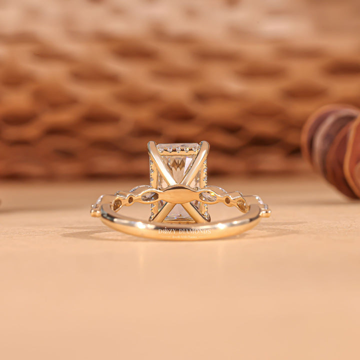 Radiant hidden halo engagement ring shown on hand for true-to-life sizing