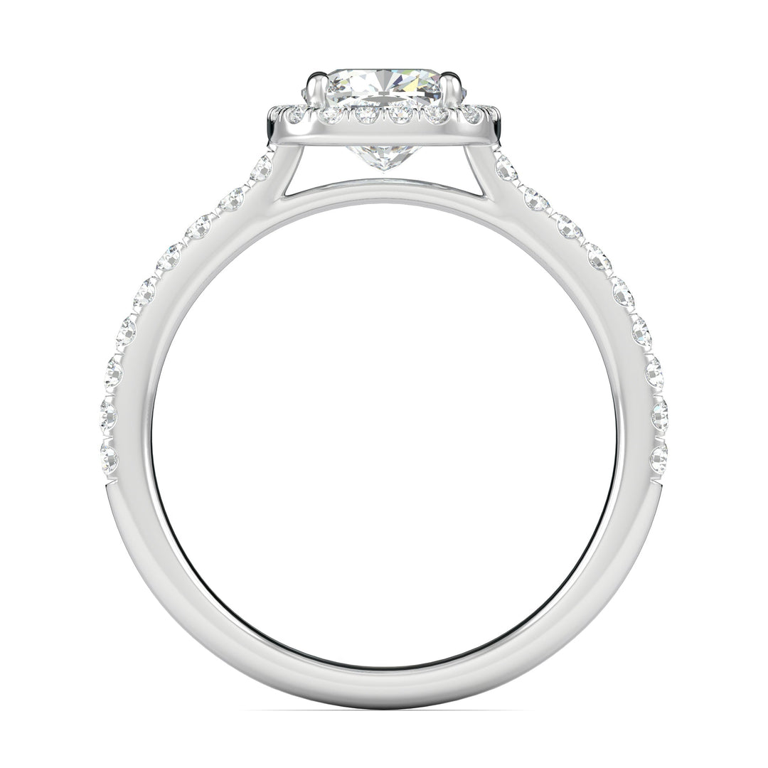 Cushion pave diamond ring displayed on jewelry stand