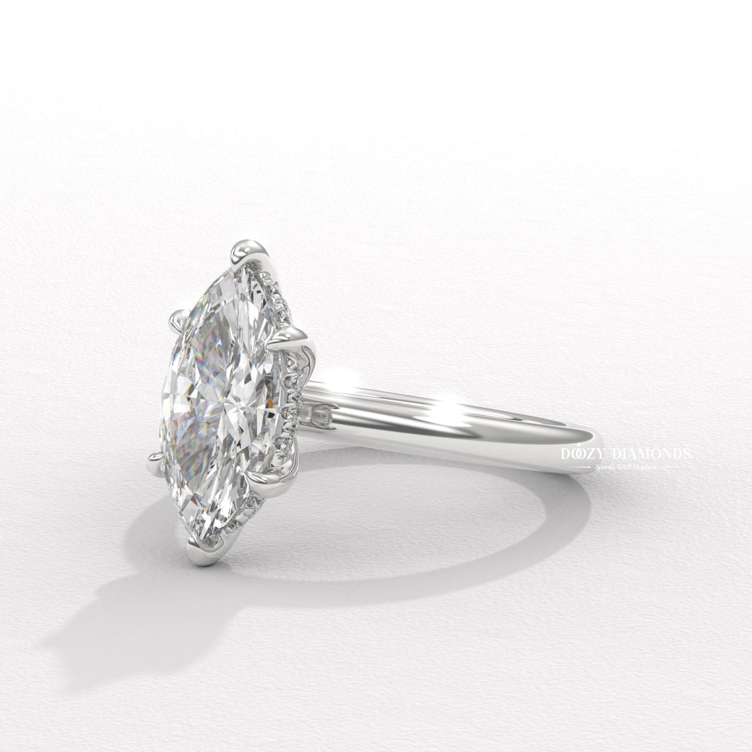 Marquise hidden halo diamond engagement ring available in multiple metals