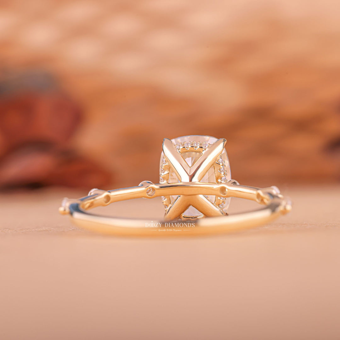 Detailed close-up of cushion pave diamond engagement ring