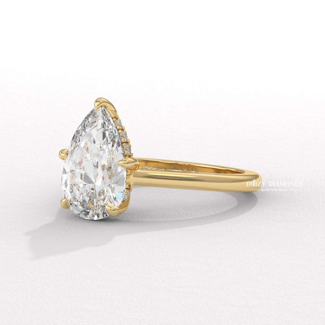 Premium pear cut solitaire engagement ring crafted in solid gold