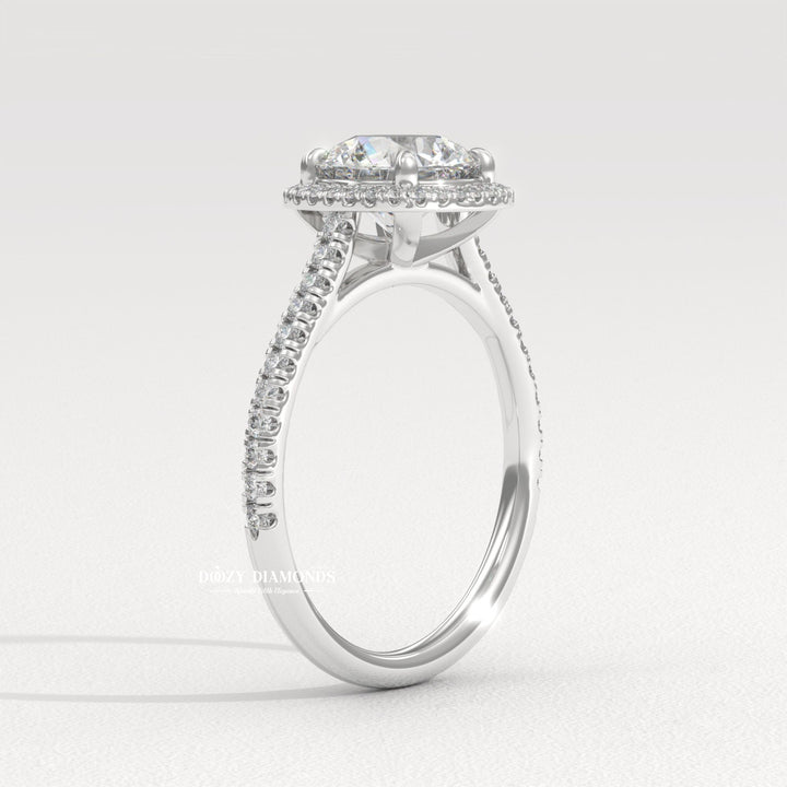 Round cut diamond ring worn on hand