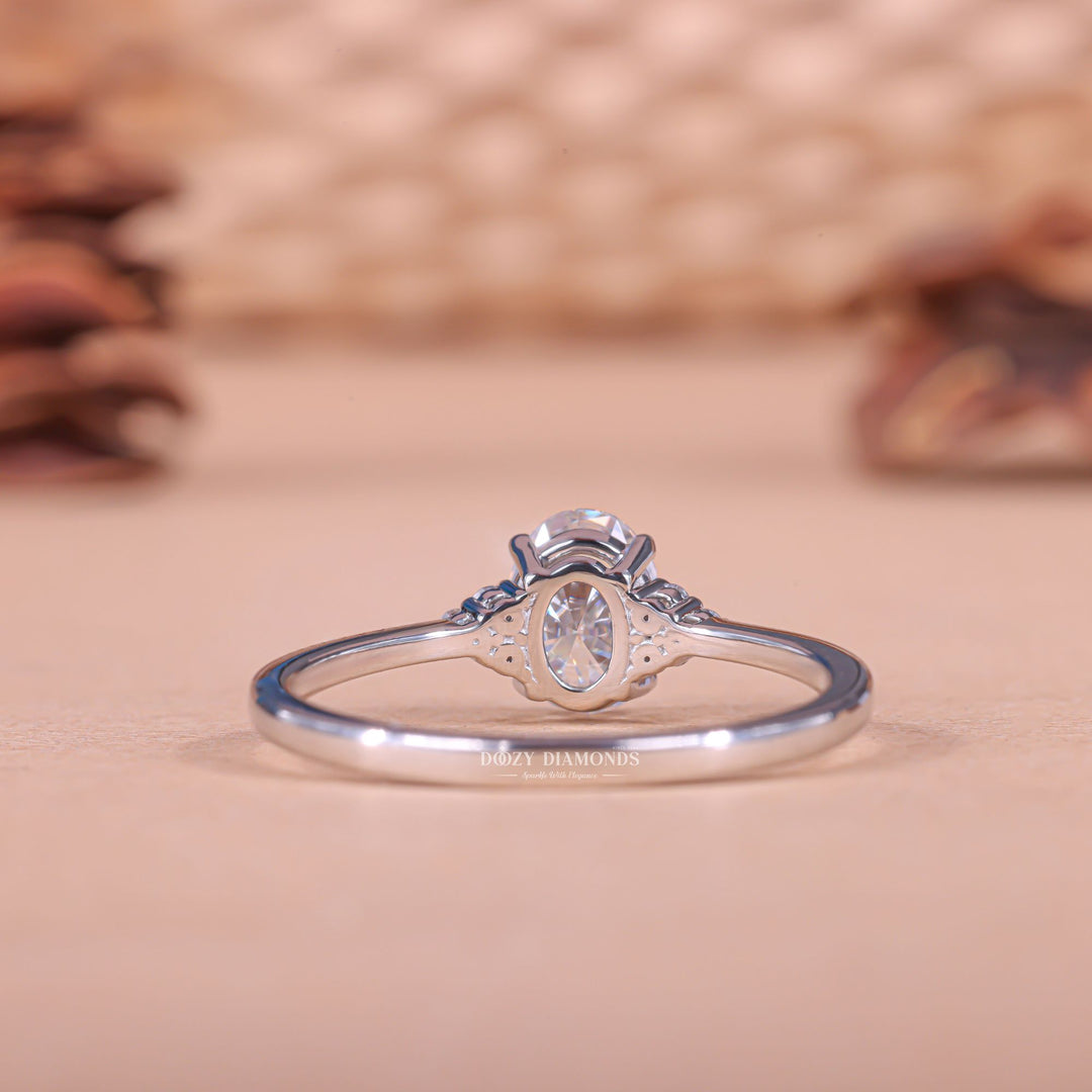 Oval cluster engagement ring with certified lab grown diamond
