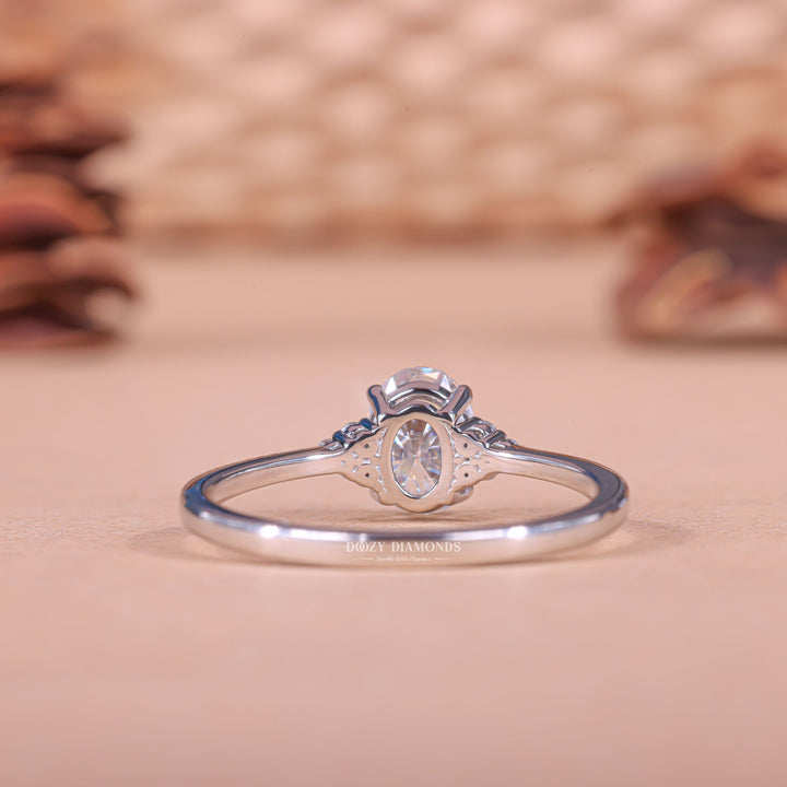 Oval cluster engagement ring with certified lab grown diamond