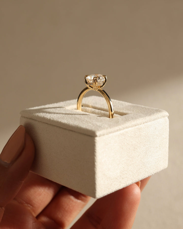 platinum hidden halo setting, white gold hidden halo setting, yellow gold hidden halo setting, rose gold hidden halo setting, contemporary gold setting, polished metal setting, smooth metal setting, fine metal setting, luxury engagement setting, bridal halo mounting,
