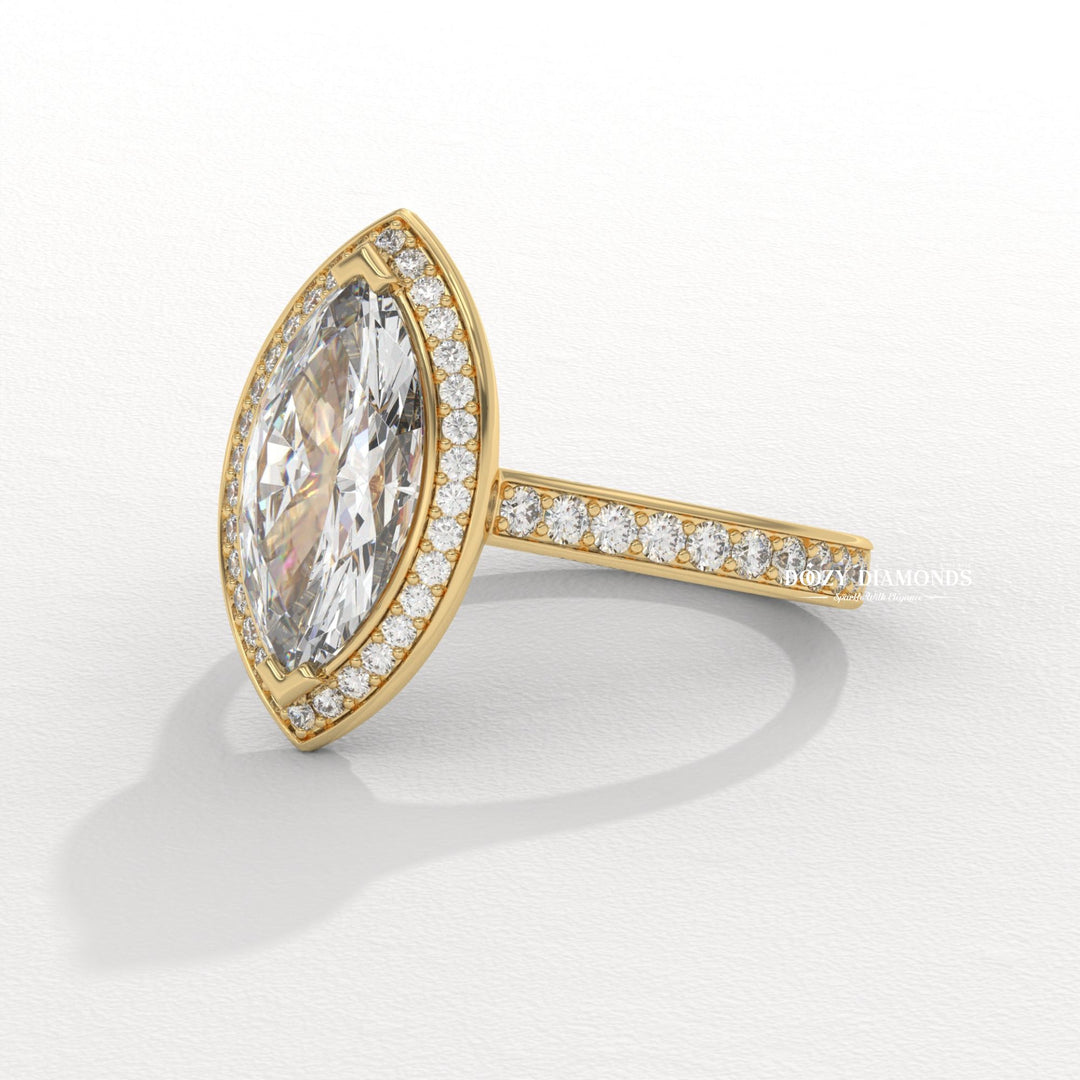 Unboxing view of marquise cut halo diamond engagement ring