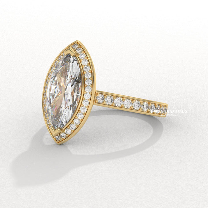 Unboxing view of marquise cut halo diamond engagement ring