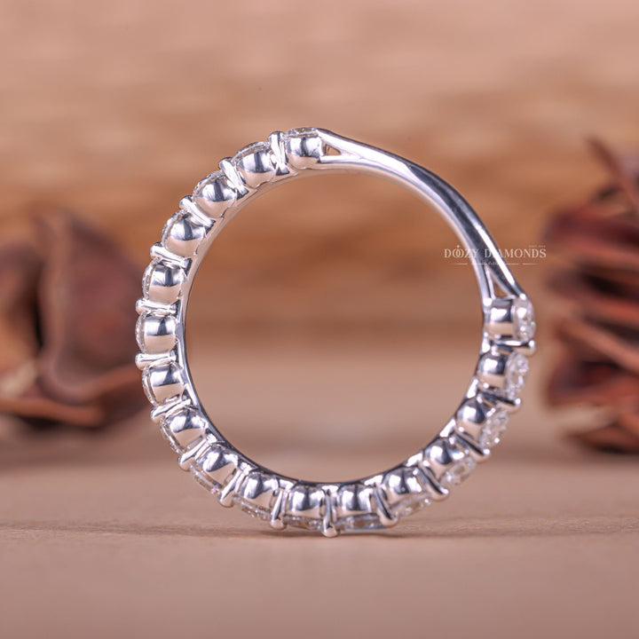 Round diamond band stacked with engagement ring