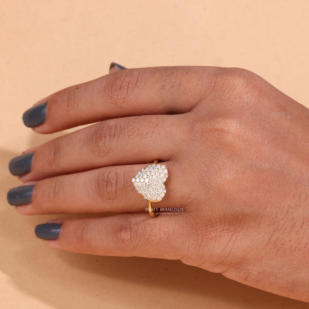 Detailed close-up of round solitaire diamond engagement ring
