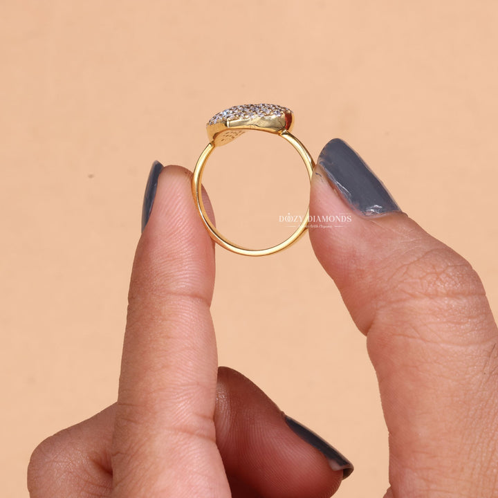 Side angle of round solitaire diamond engagement ring