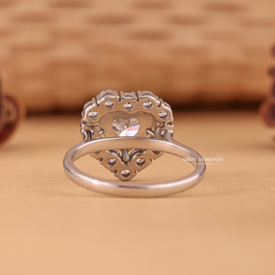 Lifestyle shot of heart halo diamond ring on hand