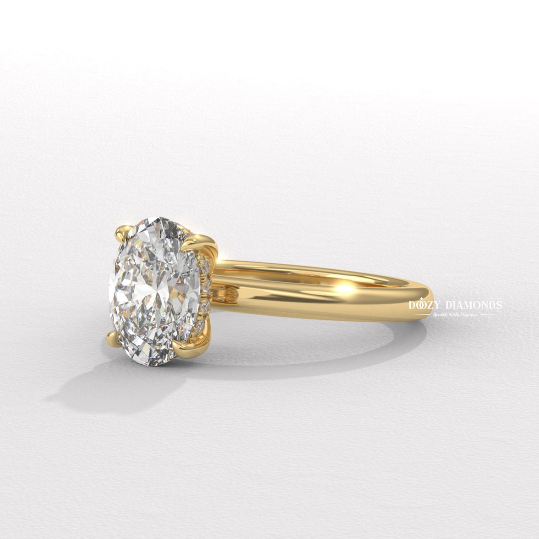 Detailed close-up of oval hidden halo diamond engagement ring