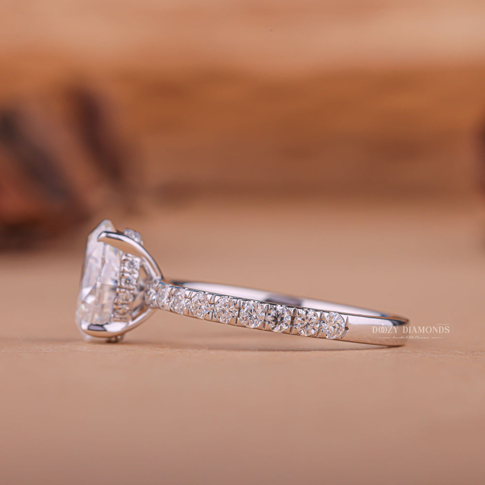 Oval hidden halo engagement ring with certified lab grown diamond