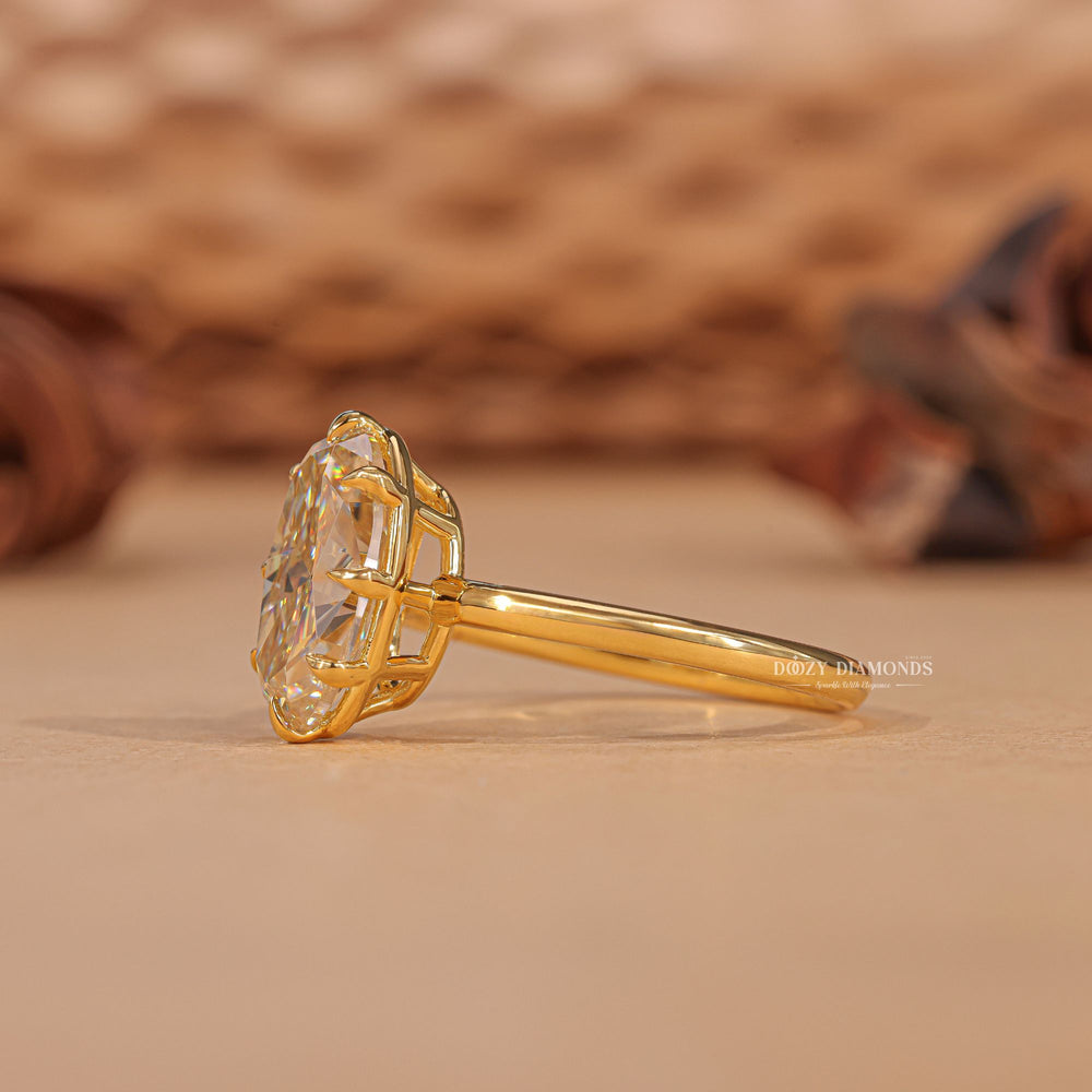 Oval solitaire lab grown diamond ring fitted on finger