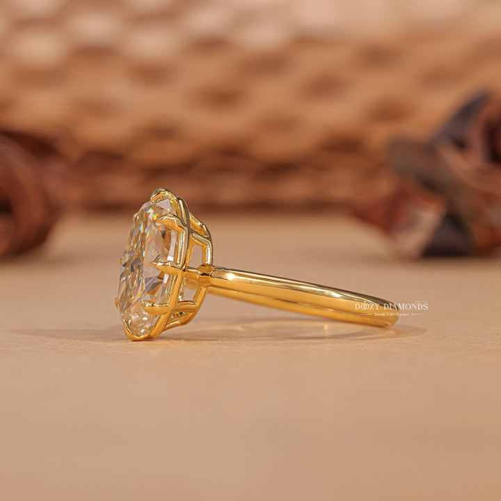 Oval solitaire lab grown diamond ring fitted on finger