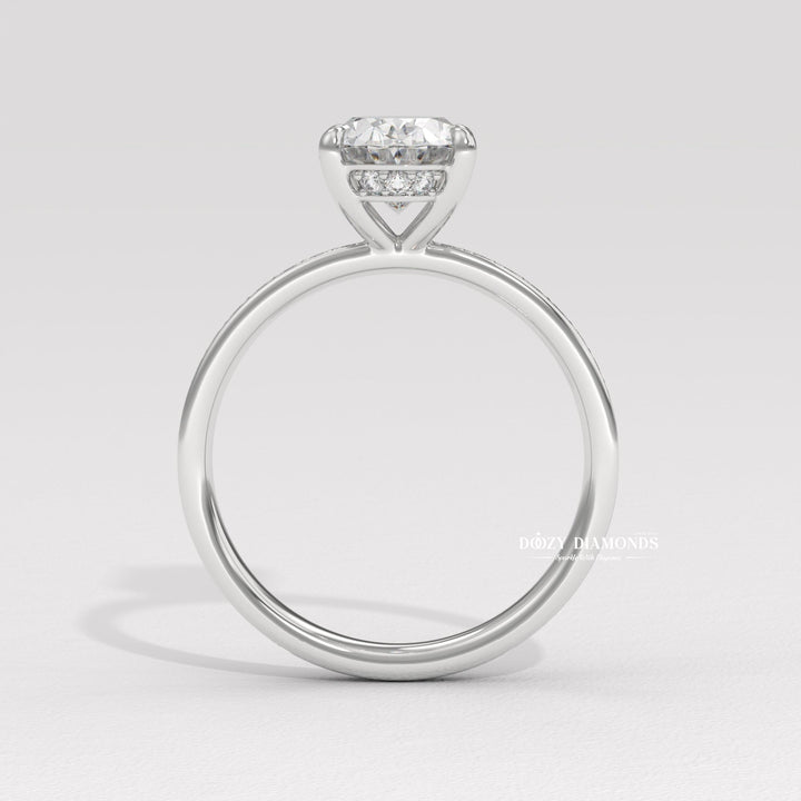 Oval cut engagement ring side view showing band detail
