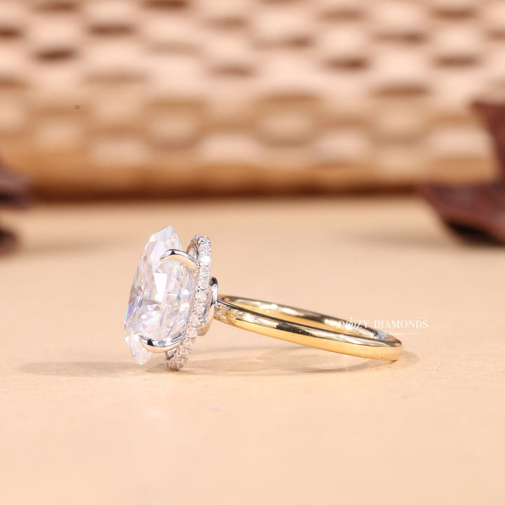 Oval cut engagement ring side view showing band detail