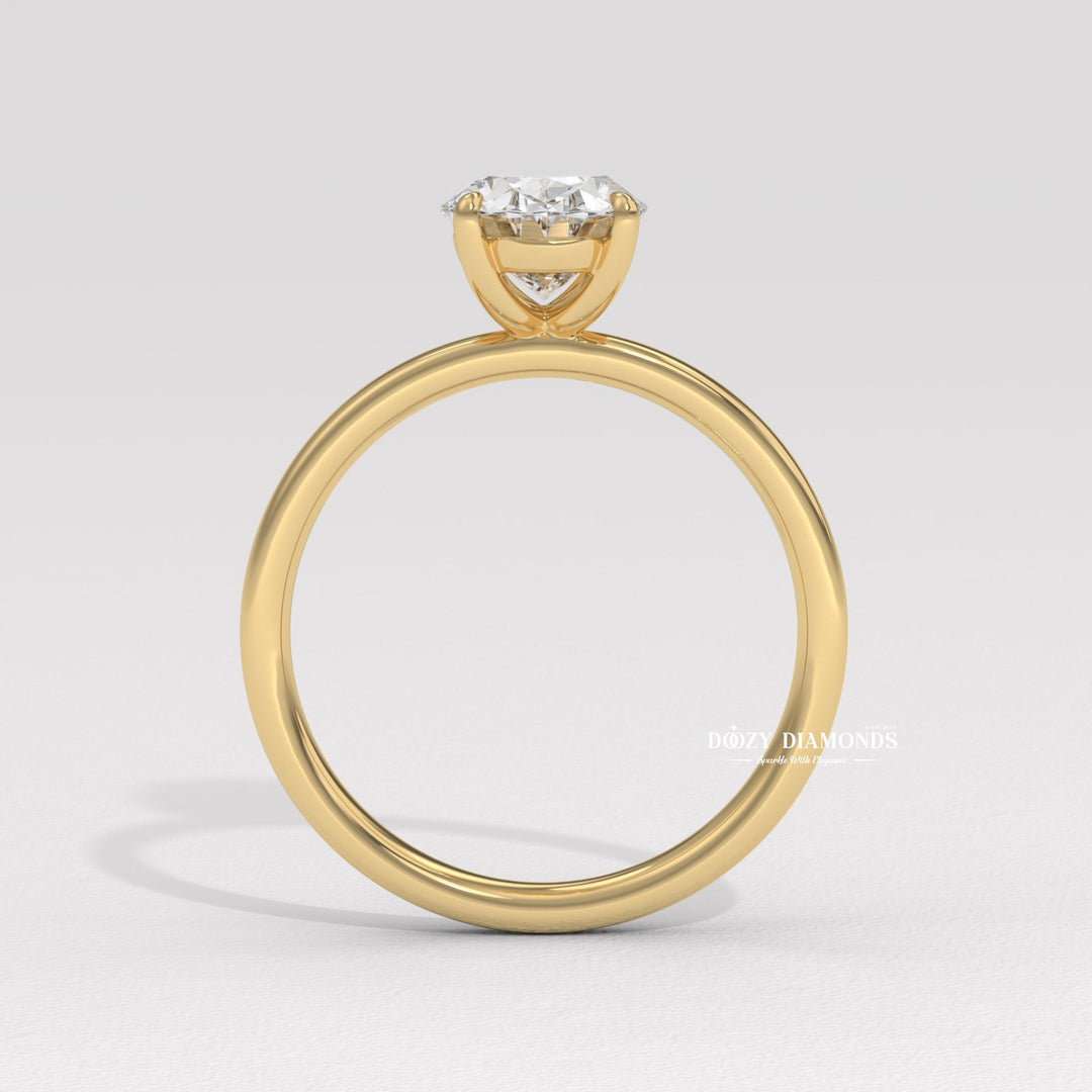 Side angle of oval solitaire diamond engagement ring