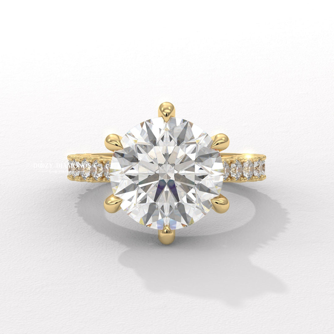 Round cut hidden halo engagement ring available to buy now