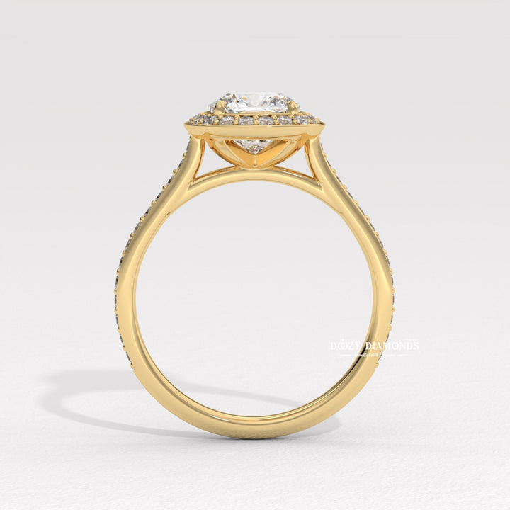 Macro shot of cushion cut diamond facets in halo ring setting