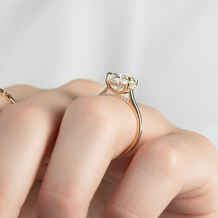 Cushion hidden halo diamond ring presented in signature gift packaging