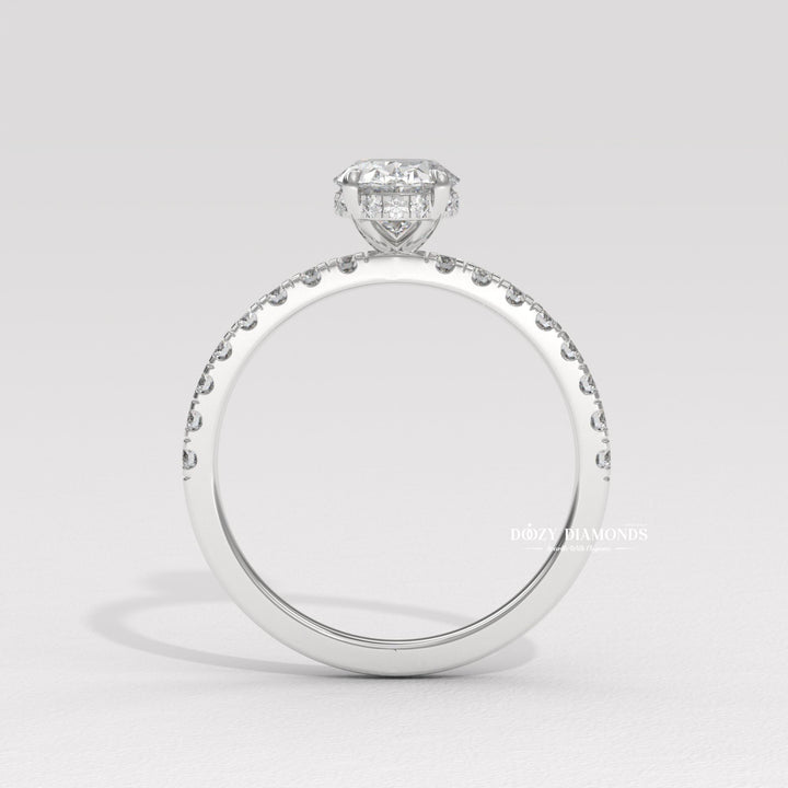 Top-down view of oval cut hidden halo engagement ring
