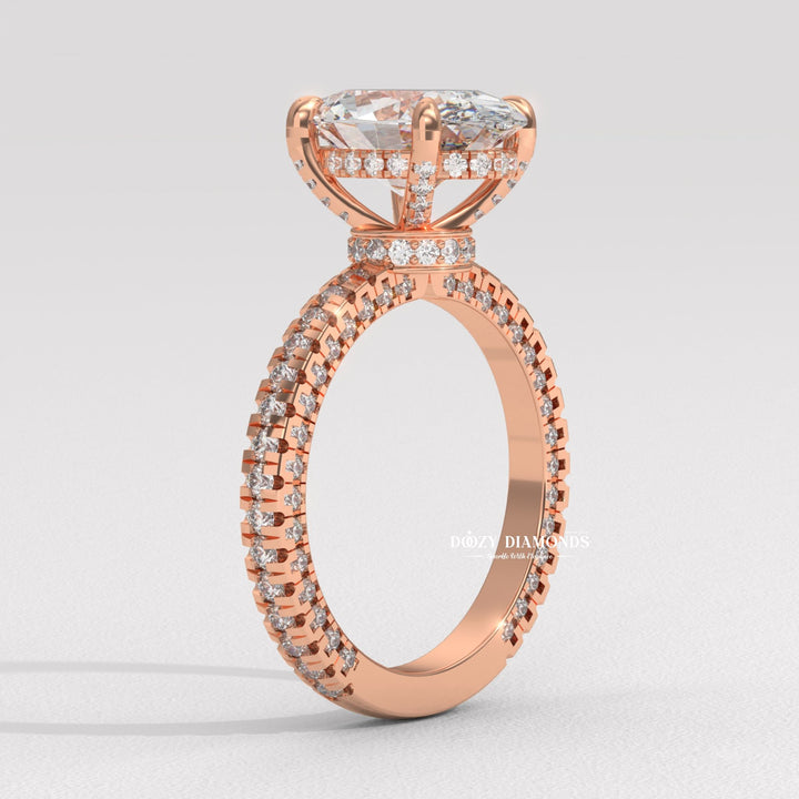 Oval pave engagement ring shown on hand for true-to-life sizing