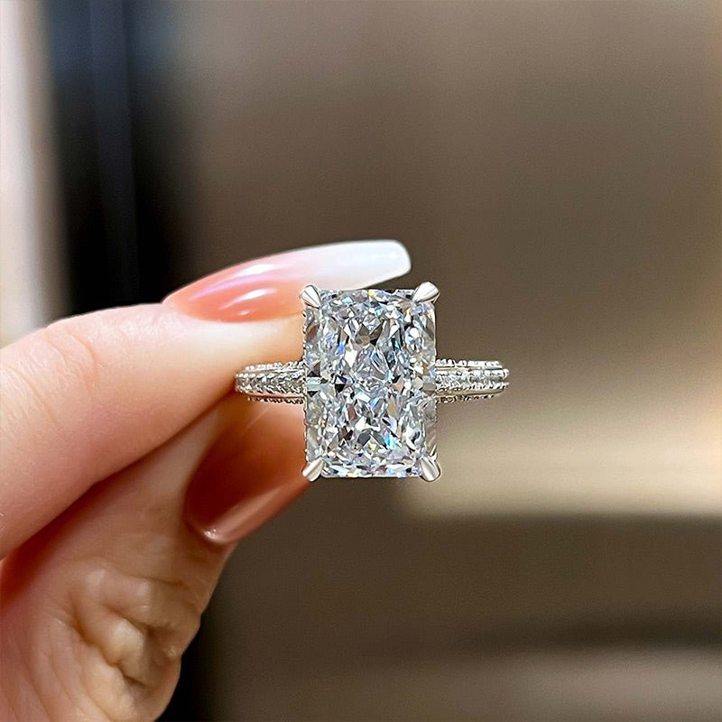 Radiant hidden halo diamond ring presented in signature gift packaging