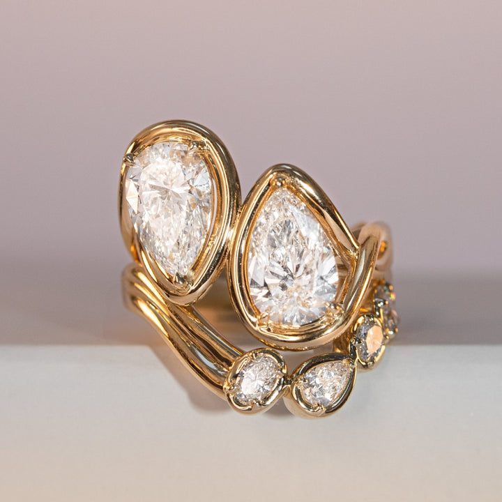 Pears, Oval and Cushion diamond band stacked with engagement ring