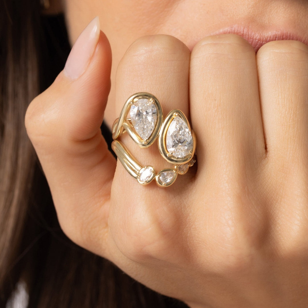 Close-up of 0.70CT pears, oval and cushion lab grown diamonds